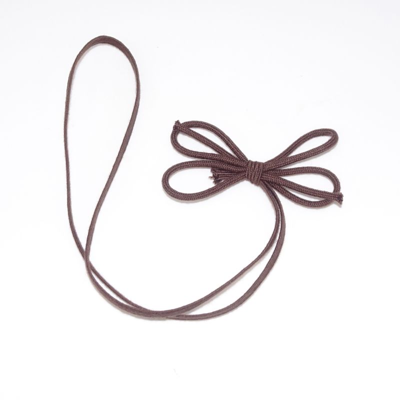 Elasticated ready-made decoration with 4-wing bow made of Tencel